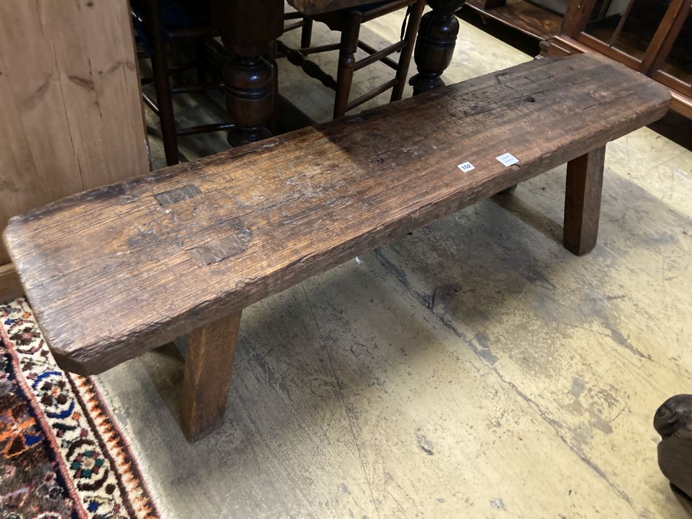 An antique pine bench, width 160cm depth 33cm height 42cm